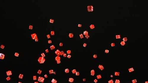 Red dice rolling and bouncing, Slow Motion