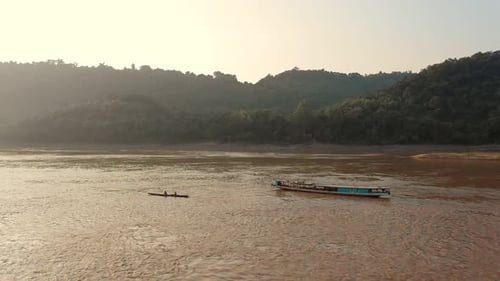 Boat In Mekong River During Sunset