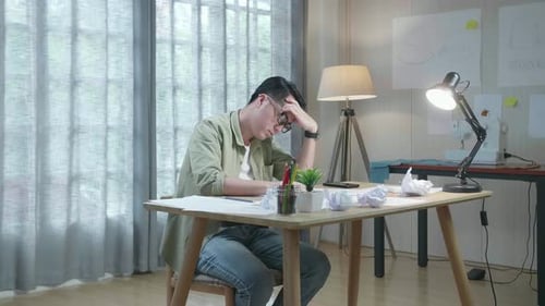 Asian Man Designer Is Upset Failing Drawing On The Layout Bond And Throw It Away