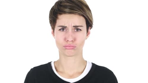Young Woman with Sad and Concerned Facial Expression