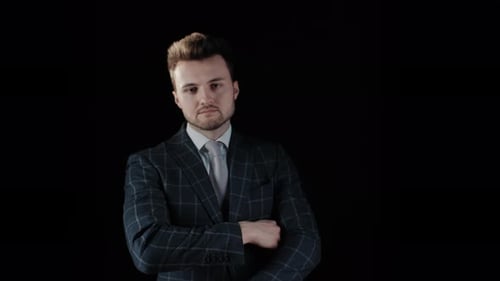 Stylish Young Man in Suit Posing Confidently
