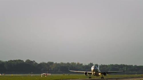Passenger airplane takes off in the morning