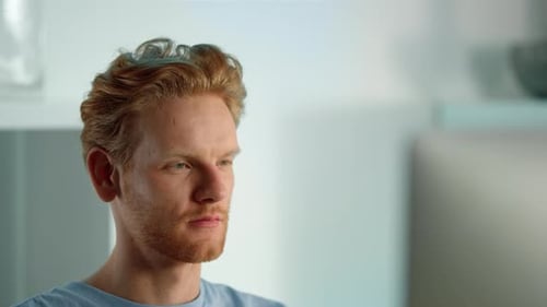 Young Adult Male Looking Off-Camera