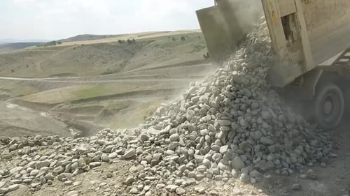 Stone shed earthmoving truck