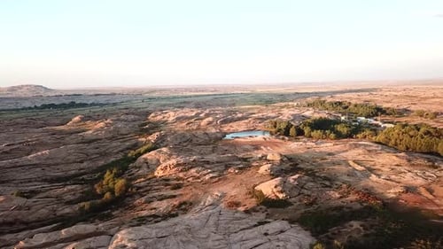 Tranquil Desert Oasis Aerial View at Sunset