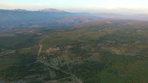 Aerial view of remote village in green valley