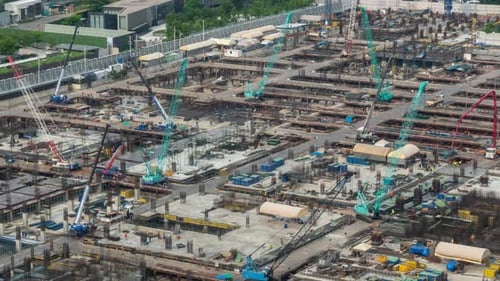 Time Lapse of Construction Site with Heavy Construction Machinery in Metropolis