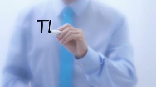 Man Writes Teamwork, Clasps Hands for Collaboration