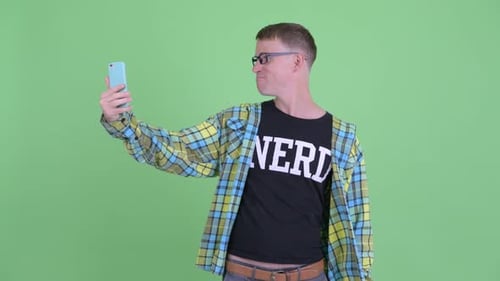Man Video Conferencing on Phone