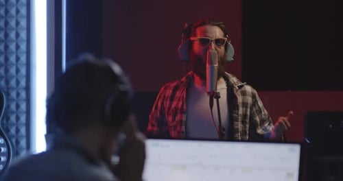 Passionate Vocalist Singing in Studio