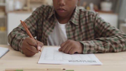 Unrecognizable Boy Having School Test