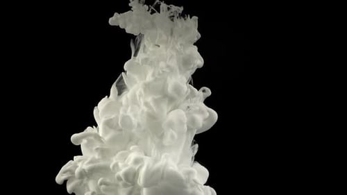 White Ink Dissolving on a Black Background