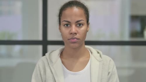 Close Up Portrait of Woman Staring at the Camera