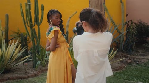 Stylish Woman Posing for Fashion Photoshoot Outdoors