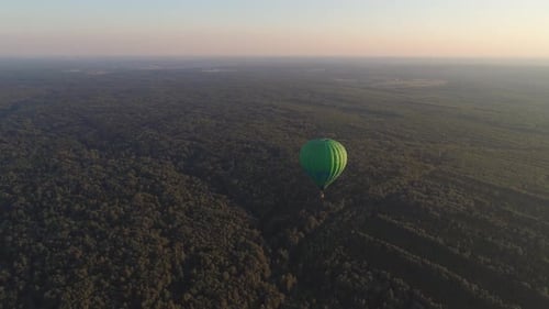 Scenic Hot Air Balloon Flight Over Forest