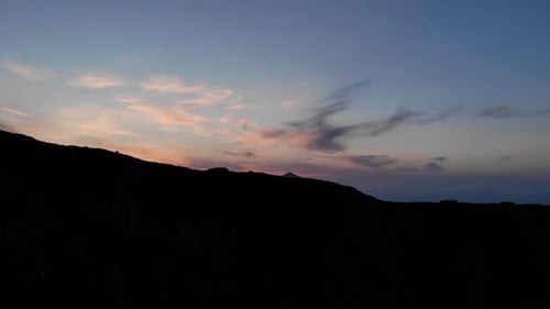 Mountains Silhouetted Against the Colorful Sunset