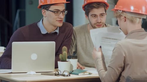 Architects Working in Office on Construction Project