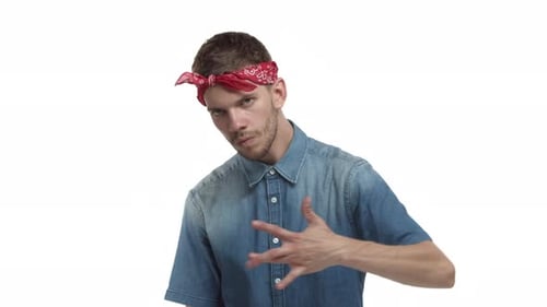 Young Man Dancing, Wearing Bandana and Denim Shirt