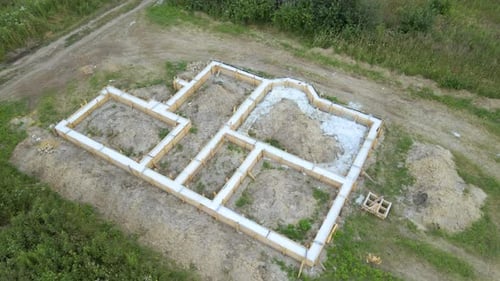 Aerial View of Building Works of New House Concrete Foundation on Construction Site