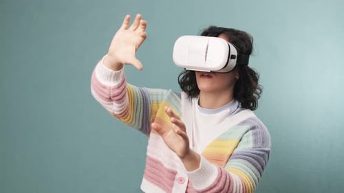 Woman Experiencing Virtual Reality With Headset