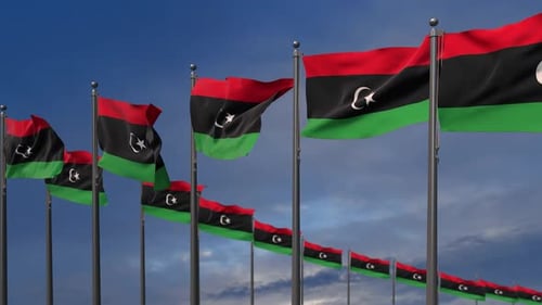 Les drapeaux de la Libye flottent dans le vent - 2K
