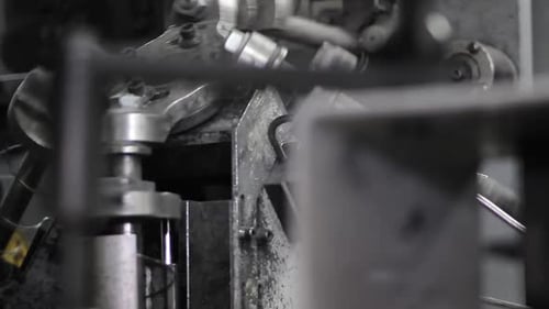 Industrial Metallic Machinery Parts Moving Close Up