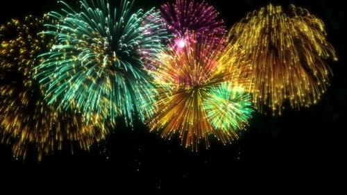 Vibrant Colorful Fireworks Exploding on a Dark Night Sky