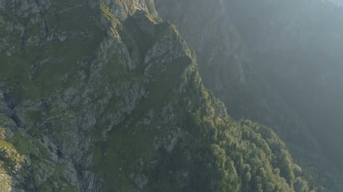 Aerial fly over high mountain