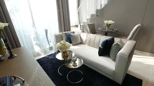 Elegant Interior Design with Sofa and Natural Light