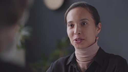Adult Woman Speaks at Job Interview Close Up