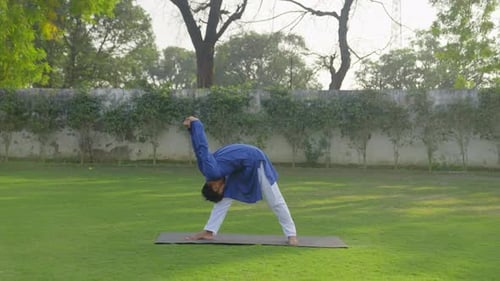 Indian man doing advance yoga