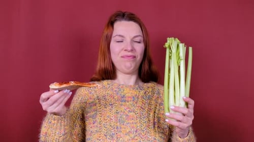 Woman Chooses Celery over Pizza