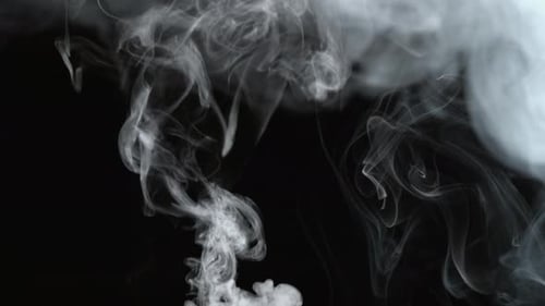Ethereal White Smoke Drifting on Black Background