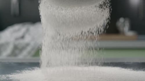 Flour Being Sifted for Baking Close Up