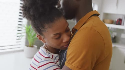 Loving Couple Sharing a Tender Embrace at Home