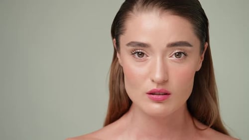 Woman with Brown Hair Smiling