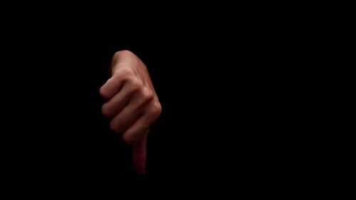 Male hands showing gesture isolated on black background