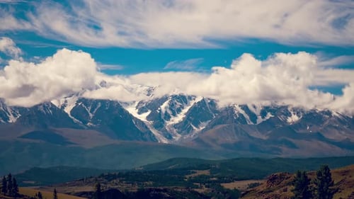 Majestic Snow-Capped Mountains Under Blue Sky