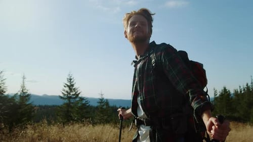 Active Man Trekking in Mountains