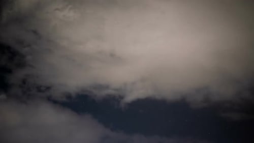 Night Sky with Clouds and Stars