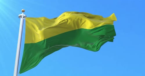 Yellow Green Flag Waving in Realistic Clear Blue Sky