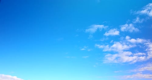 Light Blue Sky with Clouds