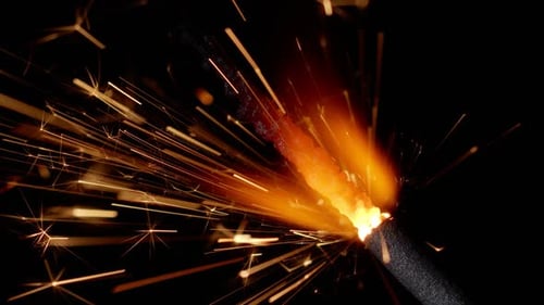 Sparkler Emitting Gold Sparks in the Dark