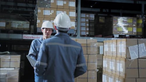 footage of engineer staff male warehouse worker in hard hat working