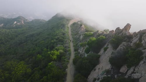 Two Persons Hiking Outdoor By Cinematic Green Mountain Trail Outdoor Nature