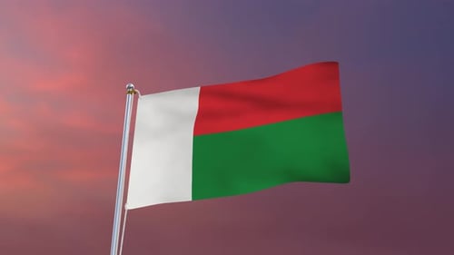 Madagascar Flag Waving in Wind with Sunset Sky Background