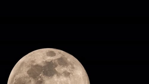 Time Lapse of Big Full Moon Rising or Moving in the Night Sky