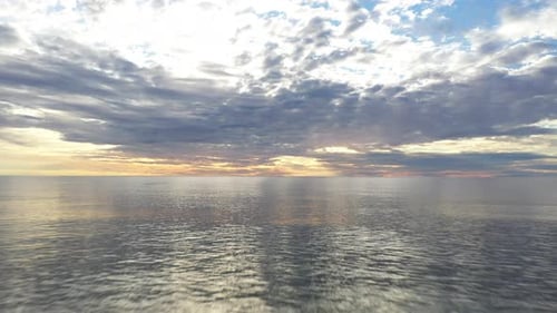 LUFTBILD: Während der Goldenen Stunde sehr tief über der Ostsee in Richtung Horizont fliegen