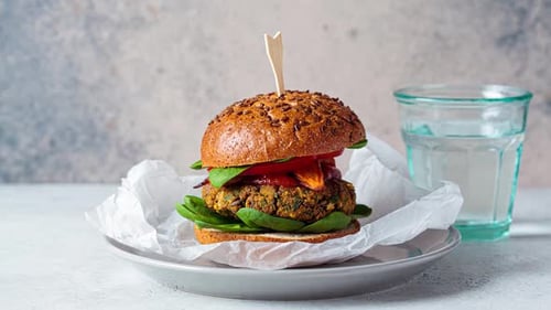 Delicious Vegan Burger Preparation with Fresh Ingredients