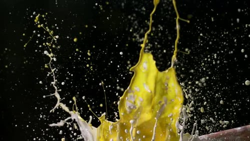 Abstract Yellow and White Paint Splash on Black